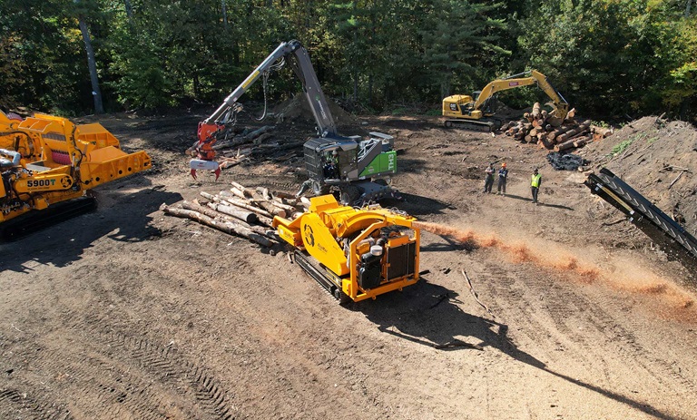 CBI Wood Chipper Processing Logs