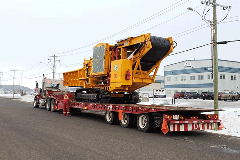 Horizontal Grinder on back of a Truck