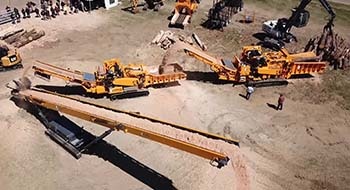 CBI horizontal grinders feeding a stacking conveyor