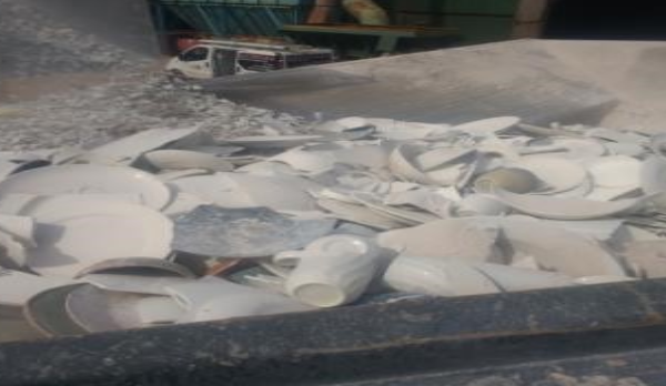 Pottery In Hopper Of Crusher