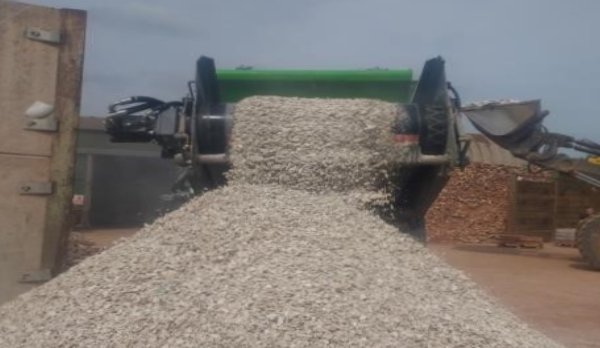 Pottery Being Crushed by Machine
