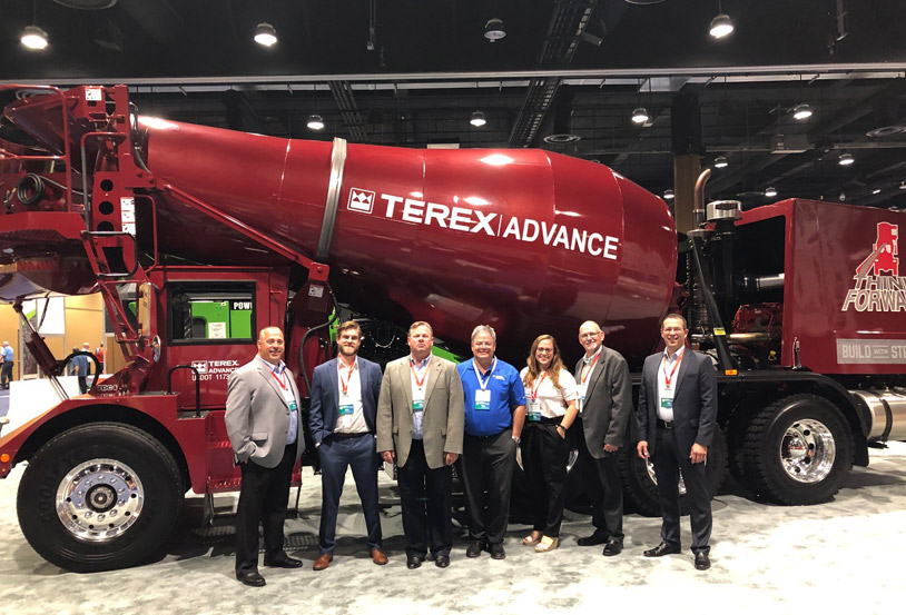Terex Advance Team in front of a Mixer Truck