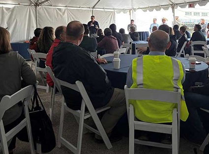 Attendees AT CBEI Listening To Speakers