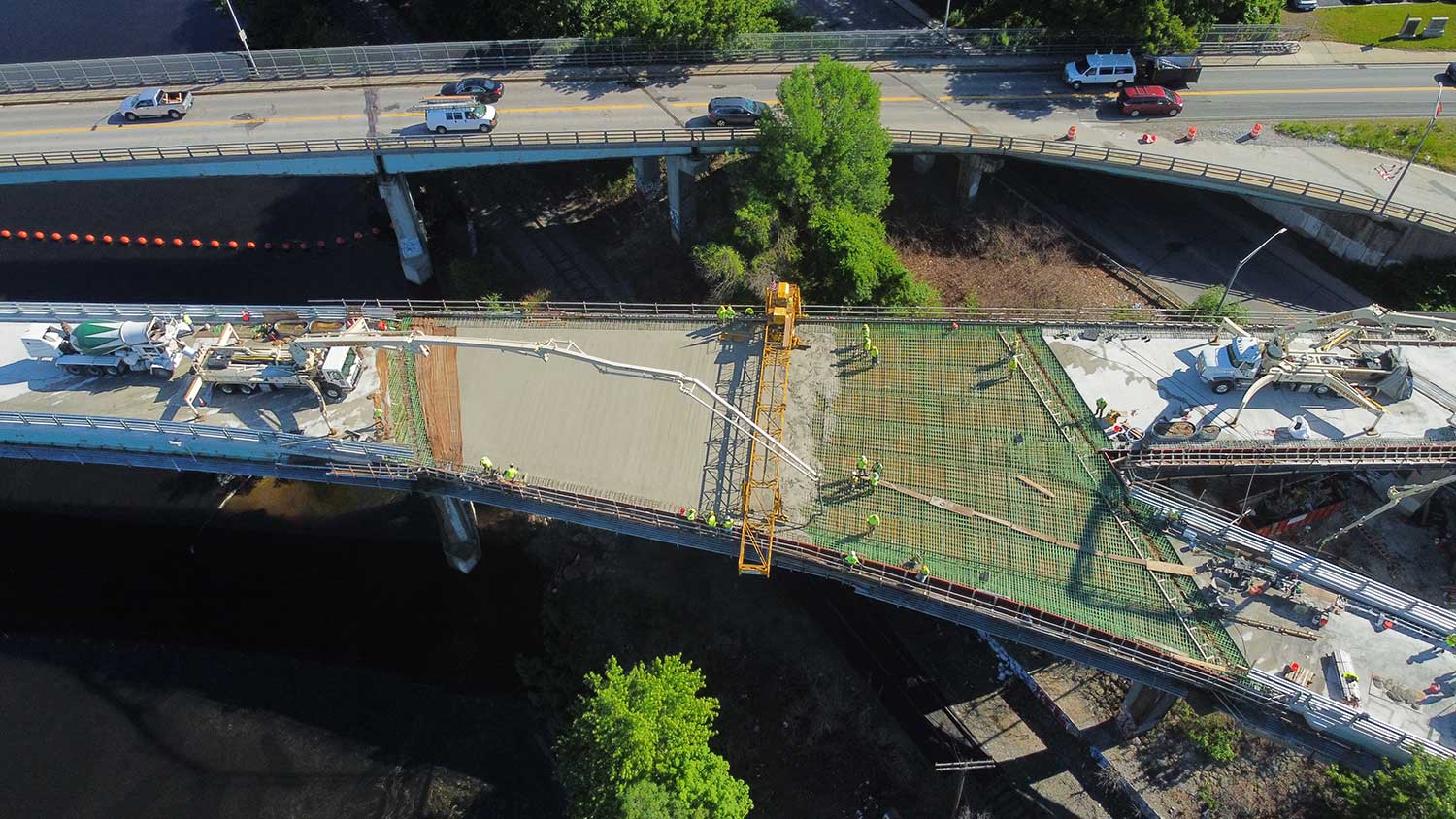 Concrete Being Poured On Bridge With Bridge Paver