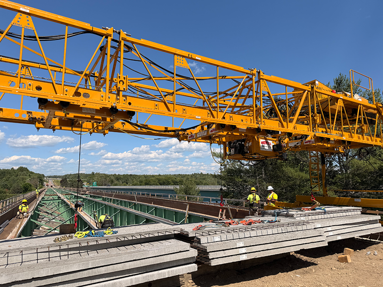 Concrete Slabs Being Lifted Into Place Using MT-1