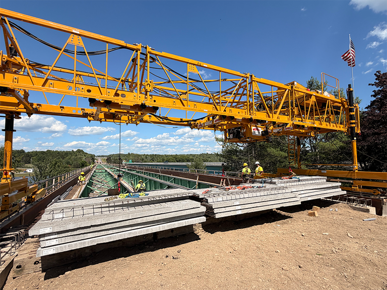 Concrete Slabs Lifted On Bridge Using Material Transporter