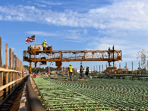 Bid-Well's MT-2 Material Transporter Working On A Bridge