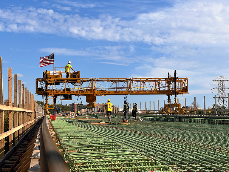 Bid-Well's MT-2 Material Transporter Working On A Bridge