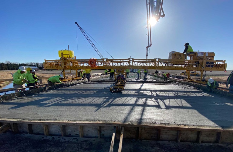 Concrete Paver Pouring Bridge