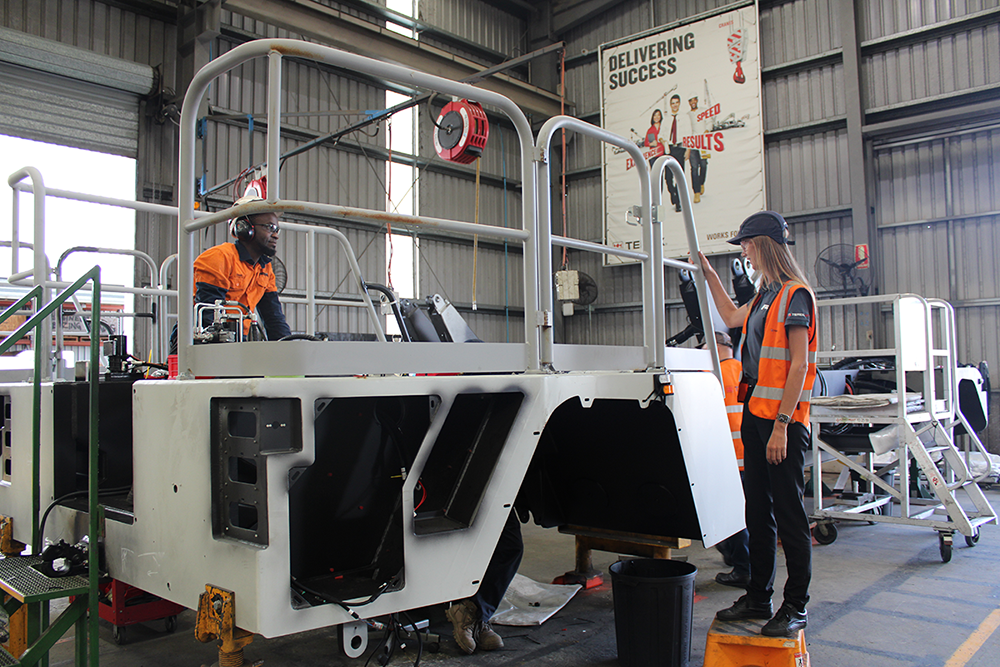 Franna Team Members Inspecting Crane in the Factory