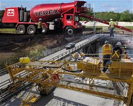 Front Discharge Mixer Trucks and Roller Pavers Front Discharge Mixer Trucks and Roller Pavers