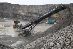 Tracked Feeder Being Fed By Shovel