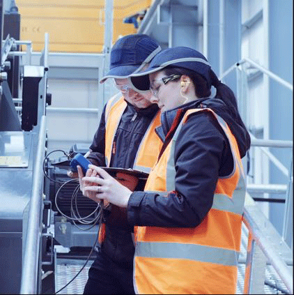 Two Engineers Working in a Factory