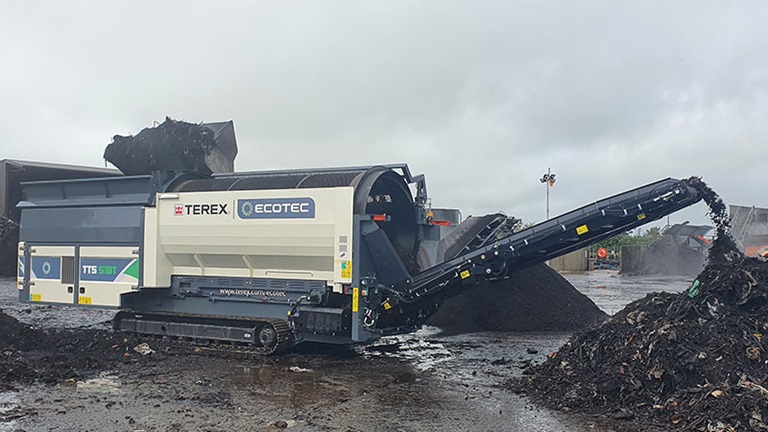 Ecotec's TTS 518T Tracked Trommel Screen Processing Green Waste