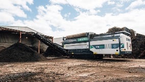 Ecotec's TTS 518T Tracked Trommel Screen Creating Soil