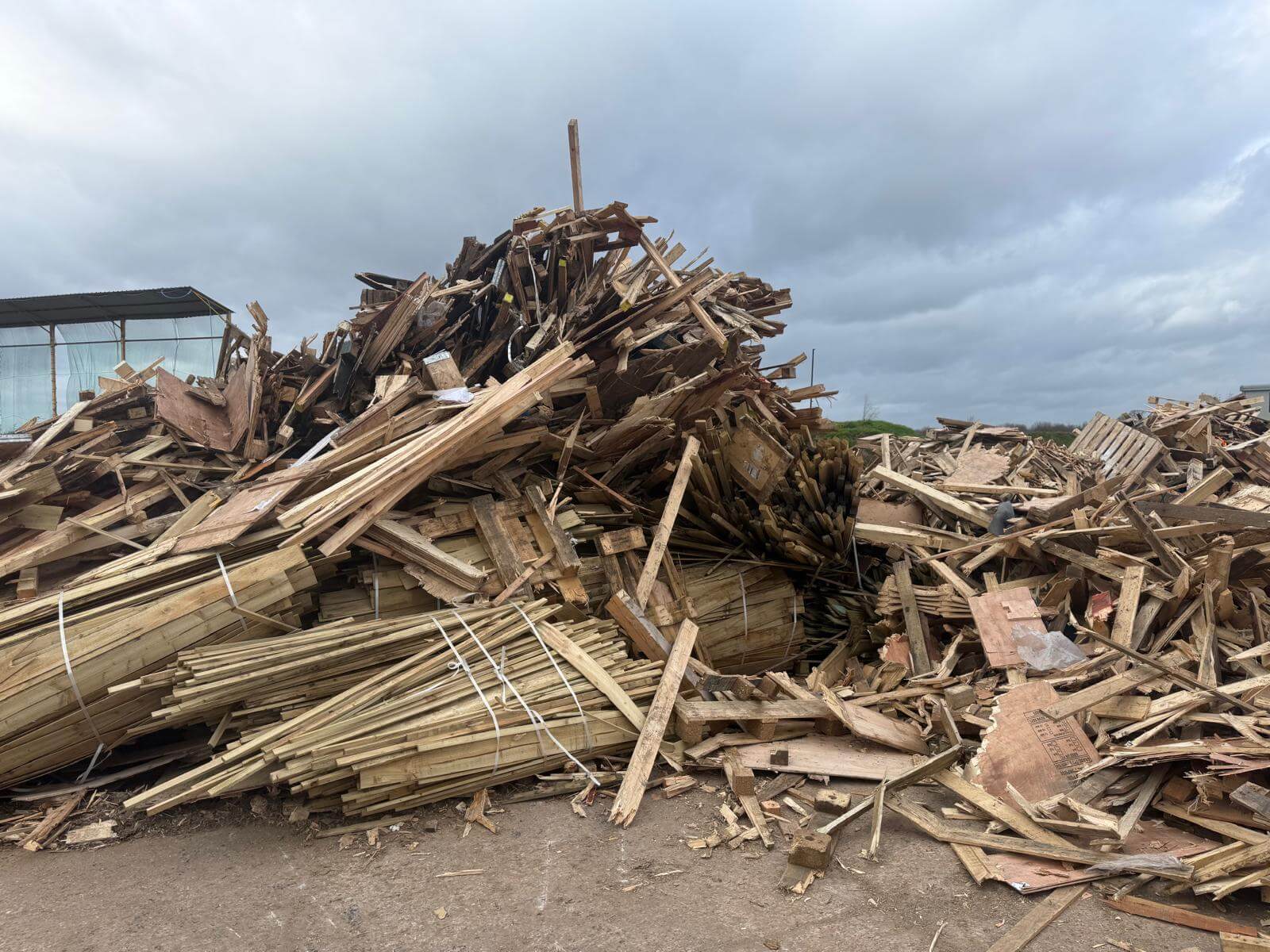 Scrap Wood Waiting To Be Processed By High Speed Shredder