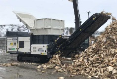 Ecotec's TDS 820 Slow Speed Shredder shredding wood