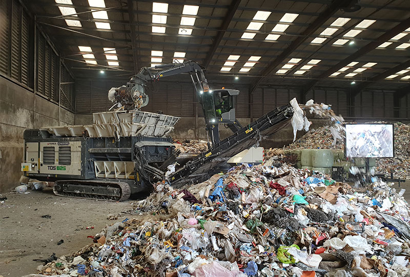 Commercial and Industrial waste being shredded by Ecotec's TDS 825 Pre Shredder