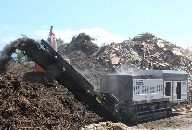 Ecotec TSS 390T Slow Speed Shredder Processing Green Waste