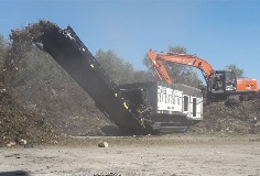 Ecotec TSS 390T Tracked Single Shaft Shredder Processing Green Waste