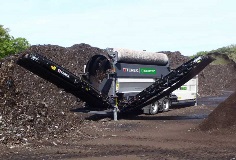 Ecotec's TTS 620 Mobile Trommel Creating Mulch
