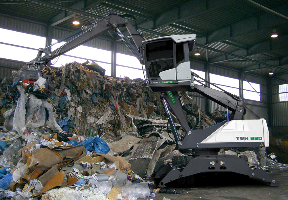 Ecotec's TWH 220 Waste Handler Lifting Waste Rubbish