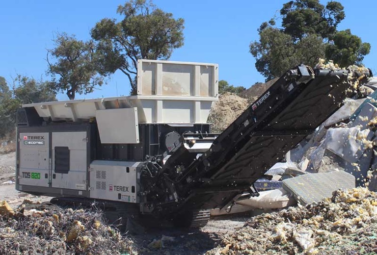 Working image of Ecotec's TDS 820 Slow Speed Shredder on site