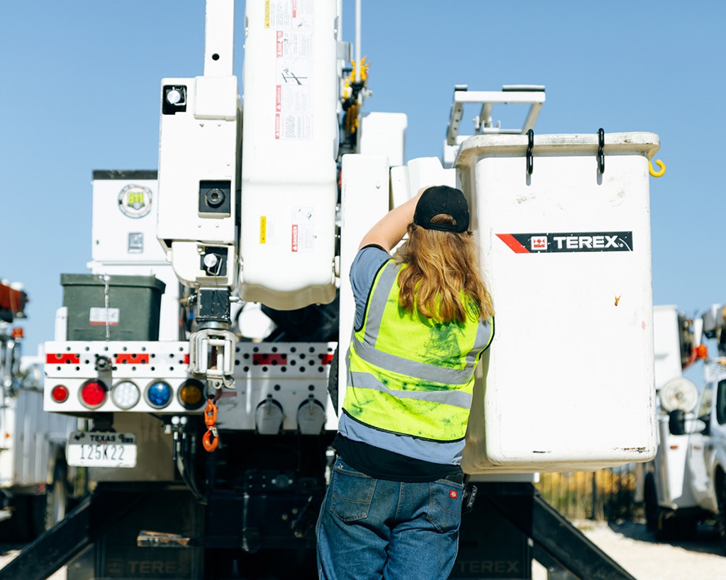 Technician working on a Terex bucket truck