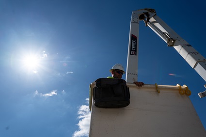 Lineworker in a Terex bucket truck