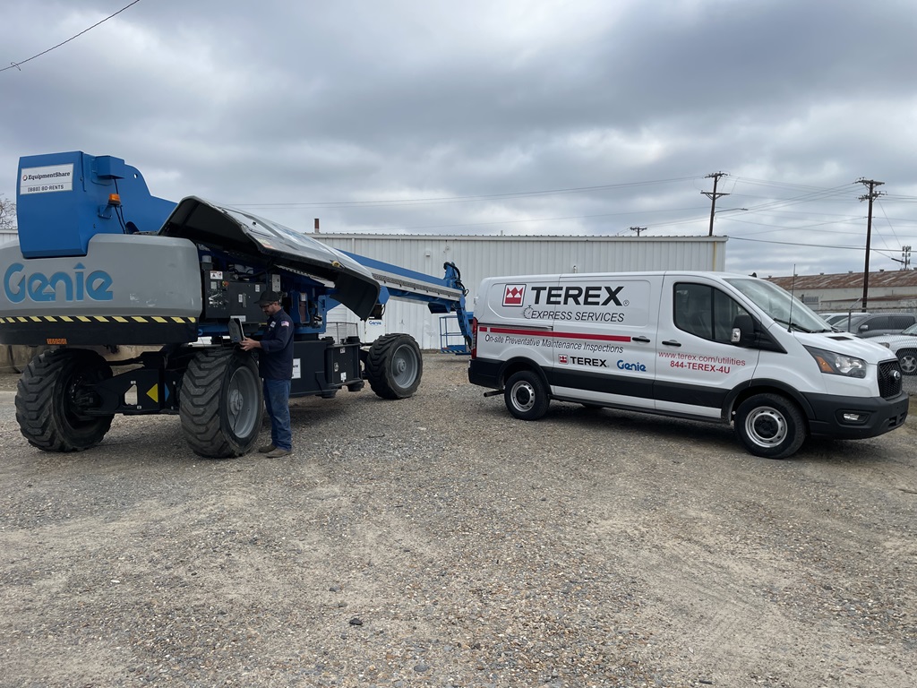 Terex Express Services Van and Technician repairing Genie lift
