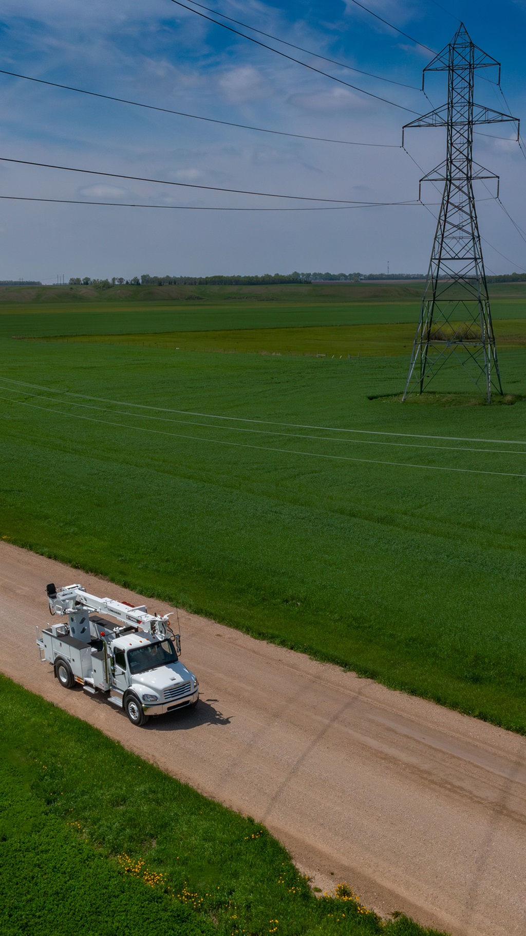 Terex digger derrick driving in rural area