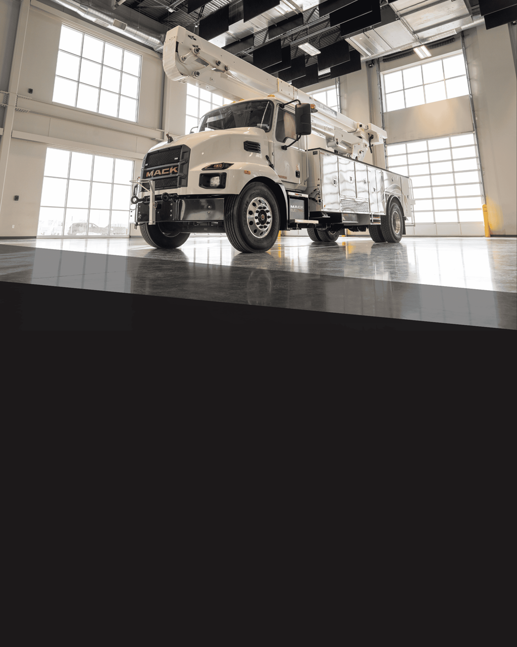 Terex Mack all-electric EV bucket truck in showroom
