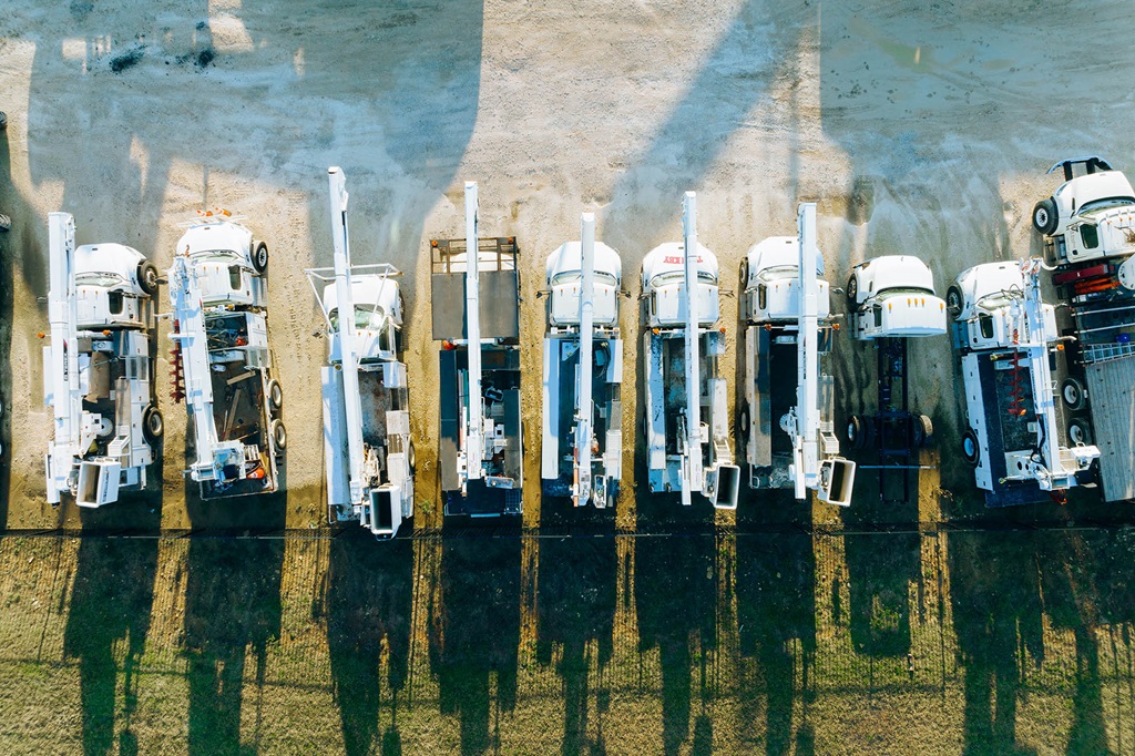 Overhead view of bucket trucks at Terex service center
