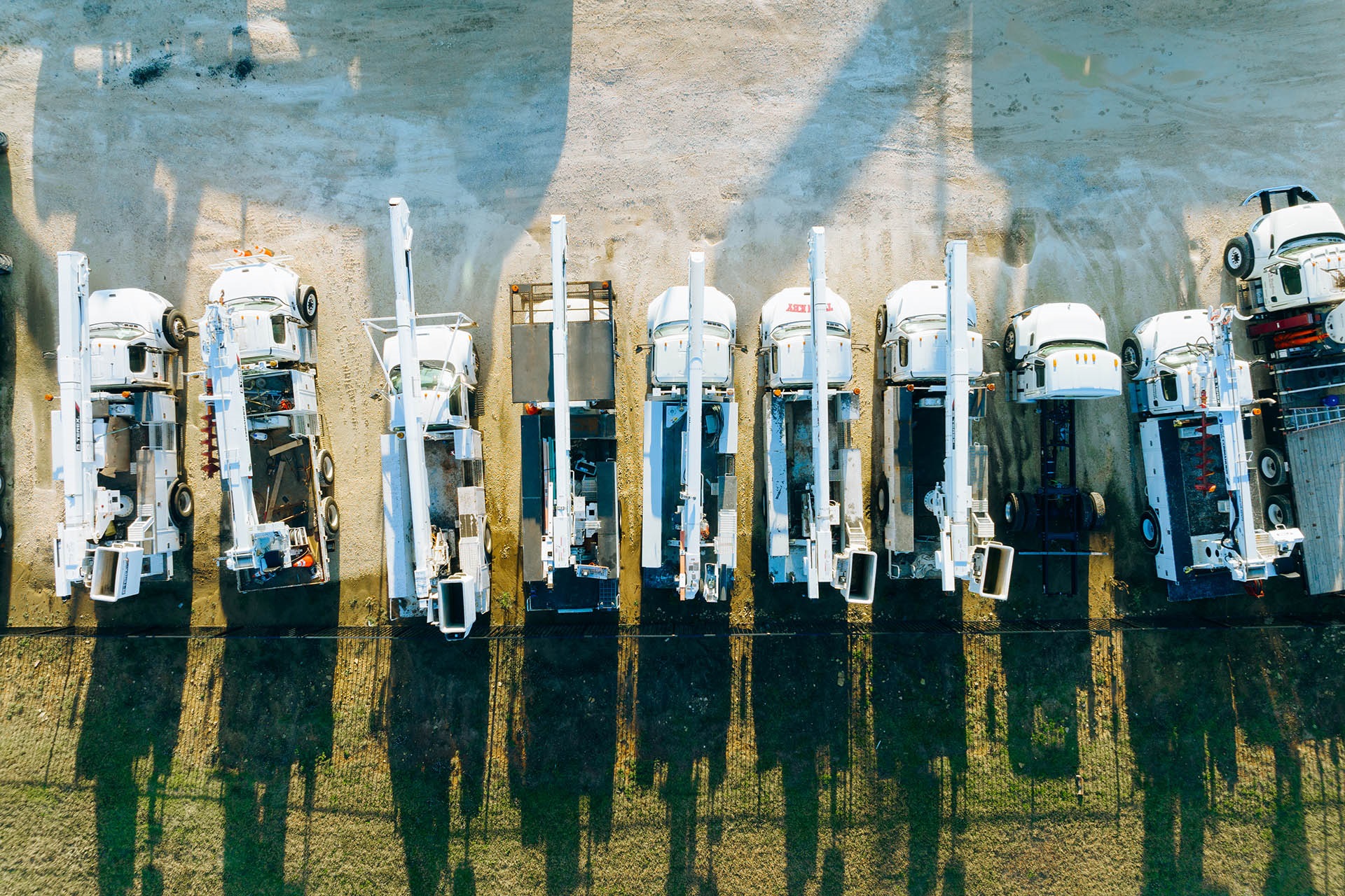Overhead view of bucket trucks at Terex service center