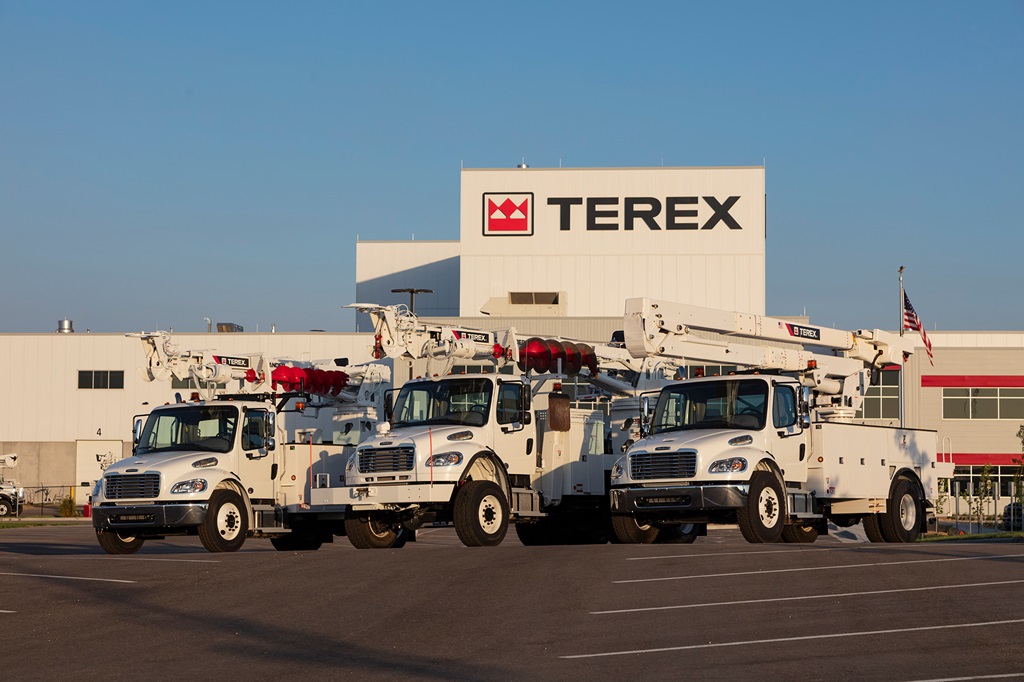 Terex trucks parked in front of Terex factory