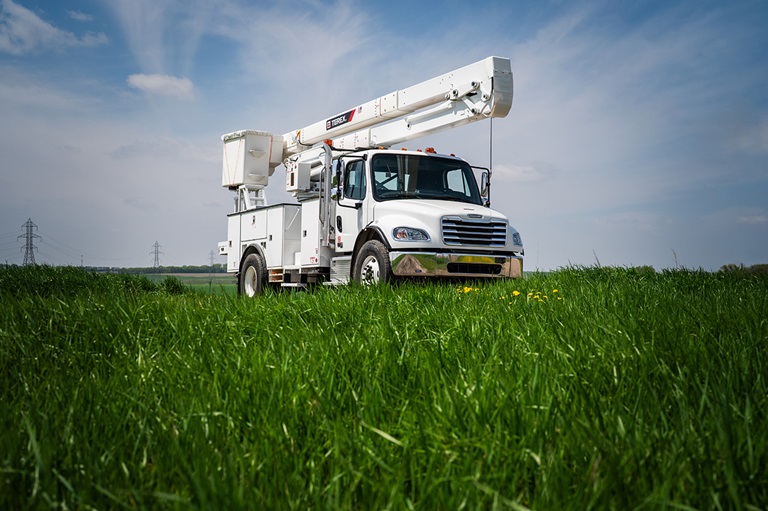 Terex TC55 bucket truck in field