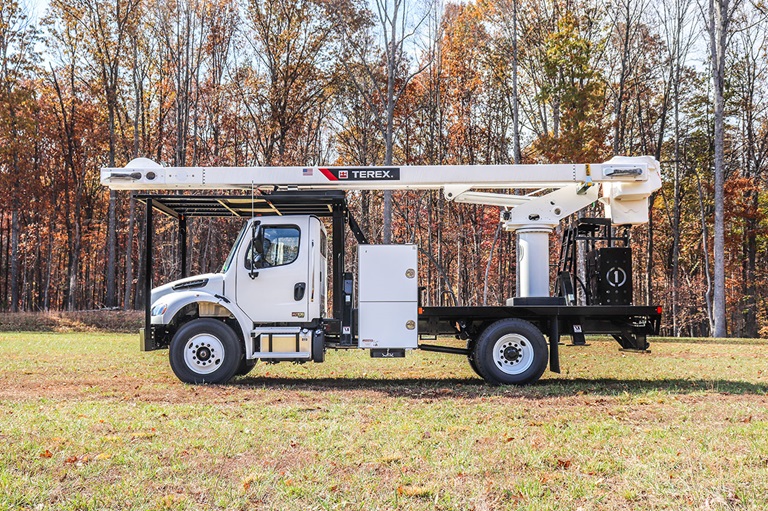 Terex XT Pro 60 tree trimmer parked in field