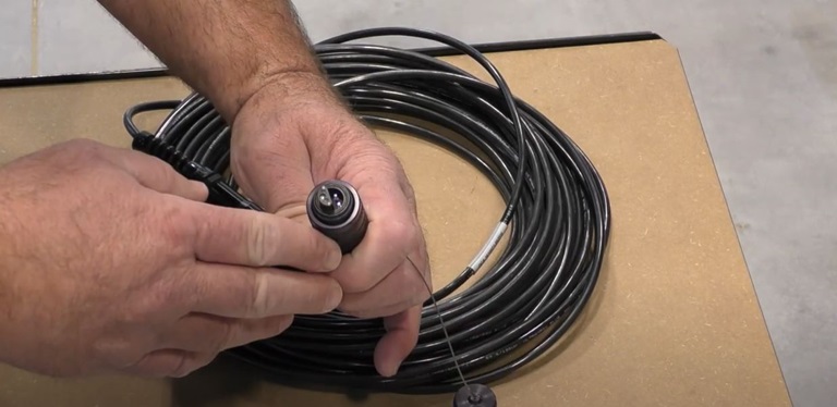 Terex technician working on fiber cable