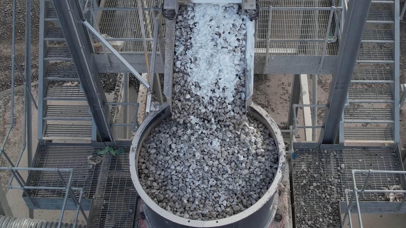 Stones Being Fed Into A Cone Crusher