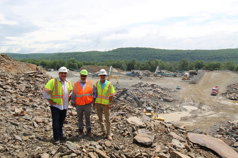 QM CEO Steve Caruso, Emerald owner Mike Tormey and QM VP of Operations Pep Hunsicker