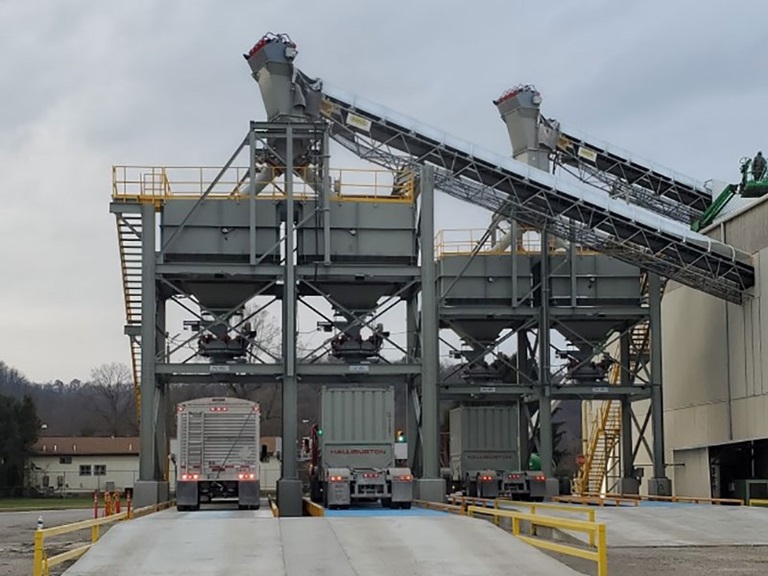 Custom Made Hoppers Being Used to Load Trucks