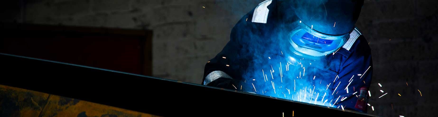 Welder Working On Marco Conveyor