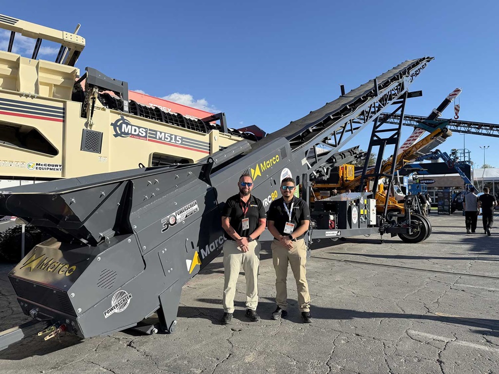 Marco Team Infront Of 80ft Wheeled Radial Conveyor At ConExpo