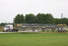 960 4 Bins Being Transported By Road