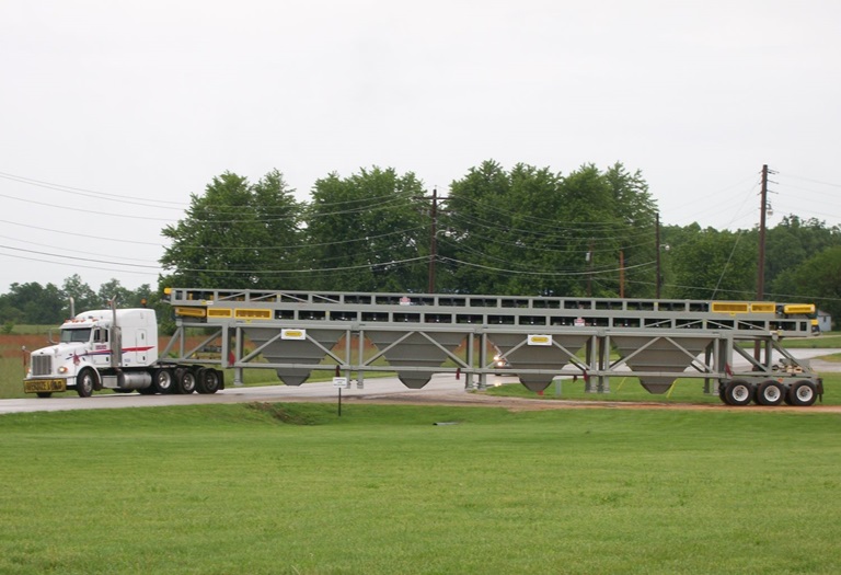960 4 Bins Being Transported By Road