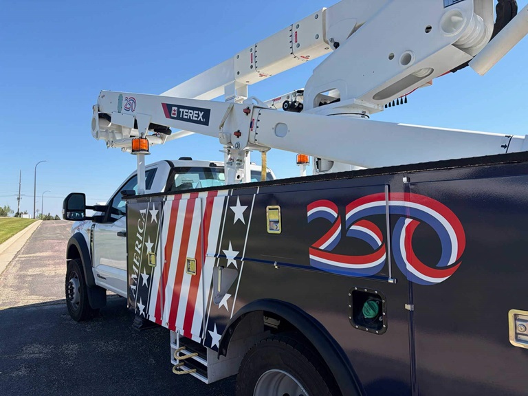 Custom-wrapped-bucket-trucks-celebrating-America’s-upcoming-250th-anniversary